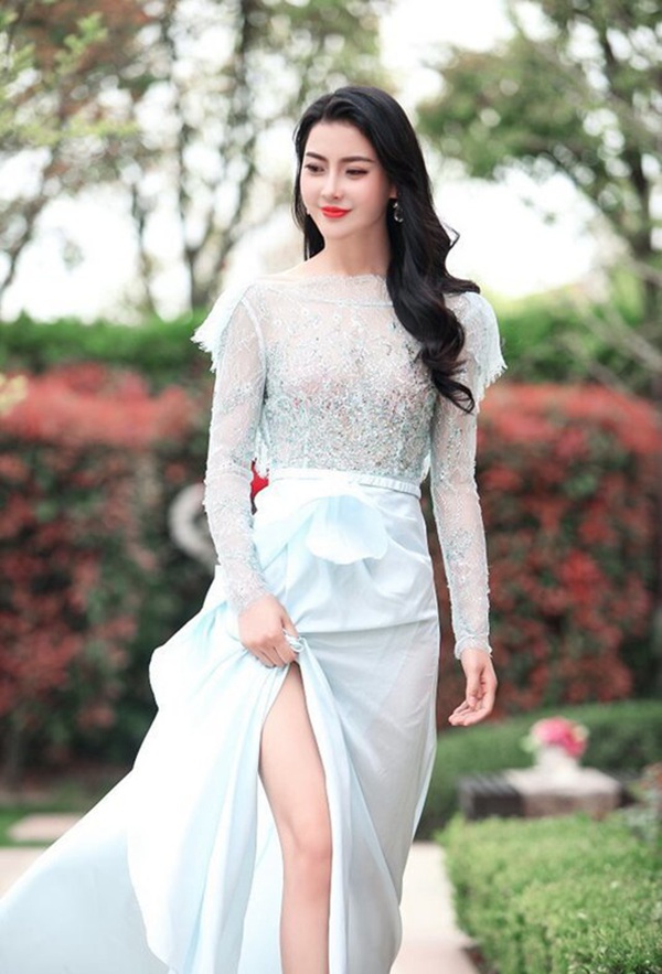 高清香港，祖籍辽宁沈阳美女关之琳黑色高开叉礼服性感图片图片