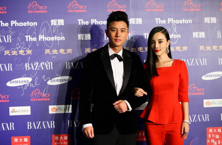 贾乃亮李小璐夫妻档出席芭莎明星慈善夜 贾乃亮出席活动图片图片