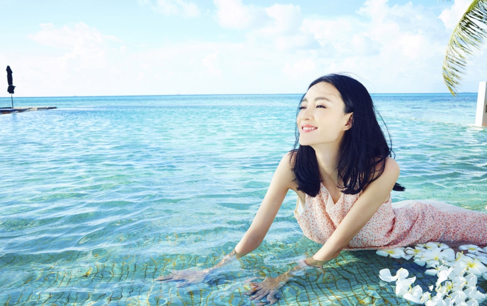 王丽坤阳光海岸写真图片 妩媚优雅甜美可人图片