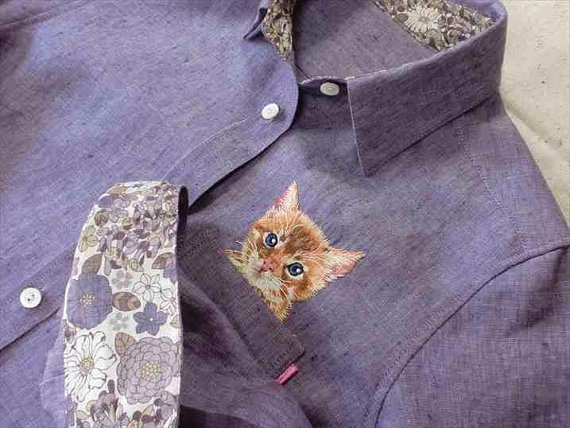 可爱猫咪手工创意刺绣图片：口袋里的喵星人图片