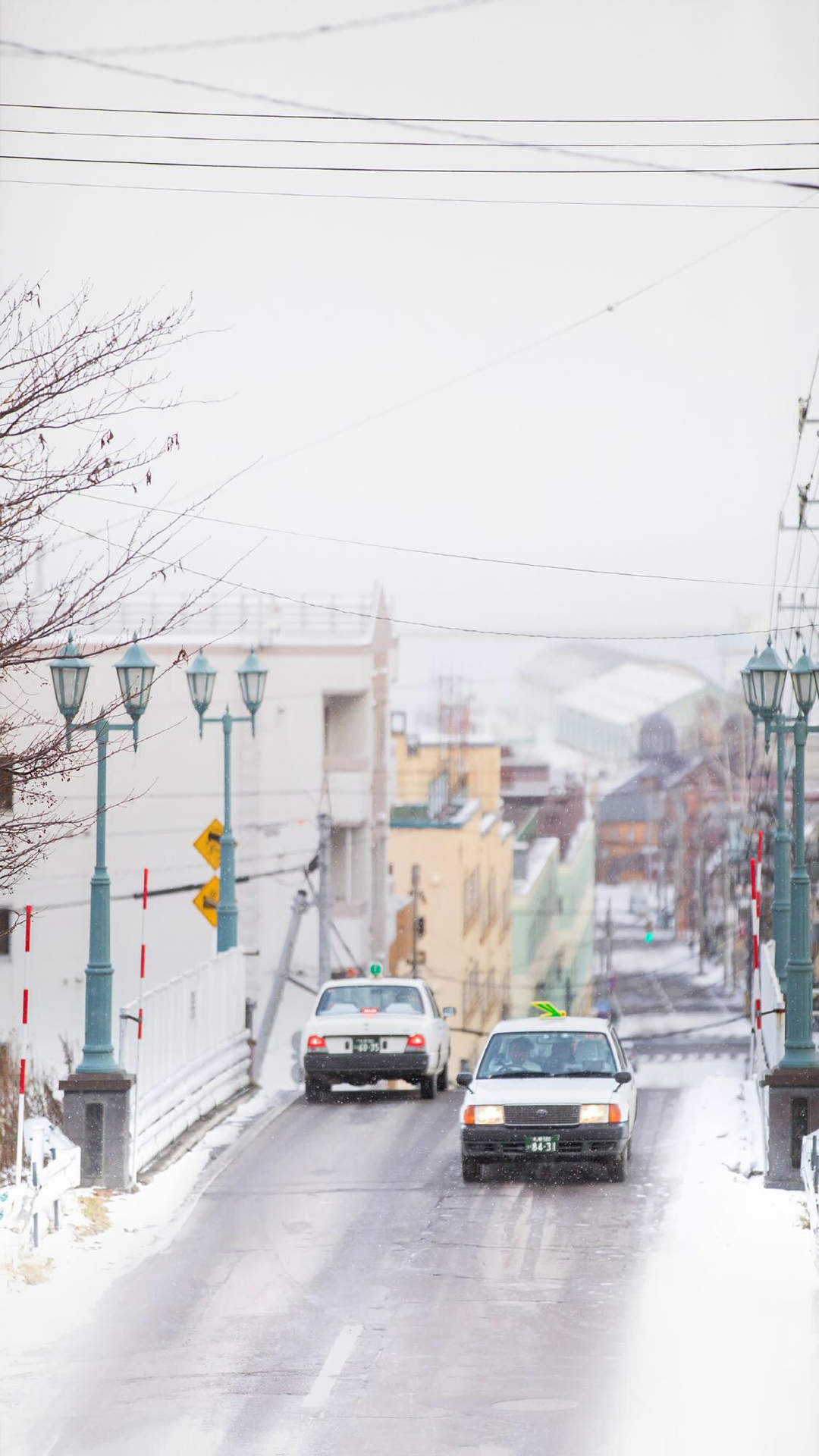 城市街道雪景图片高清手机壁纸图片