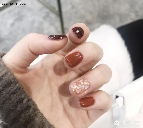 橙美甲图片