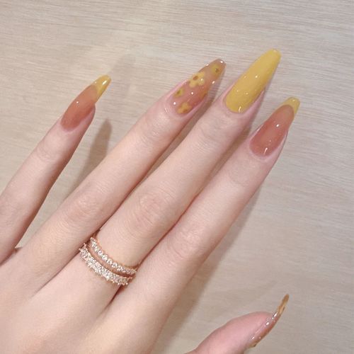 橙美甲图片