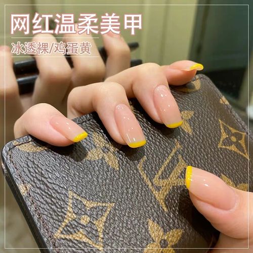 橙美甲图片
