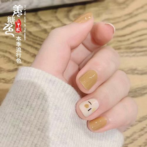 橙美甲图片
