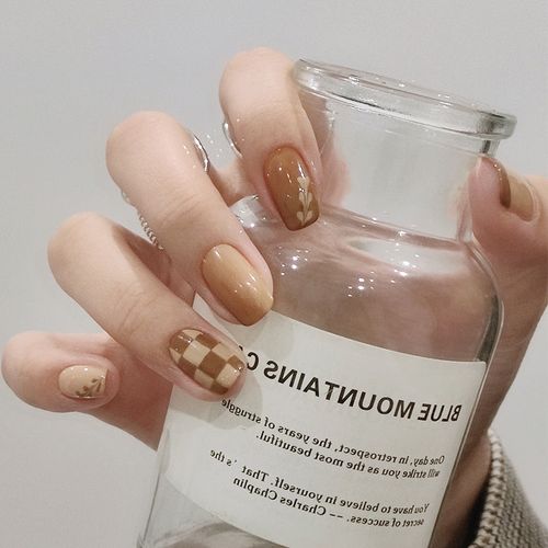 橙美甲图片
