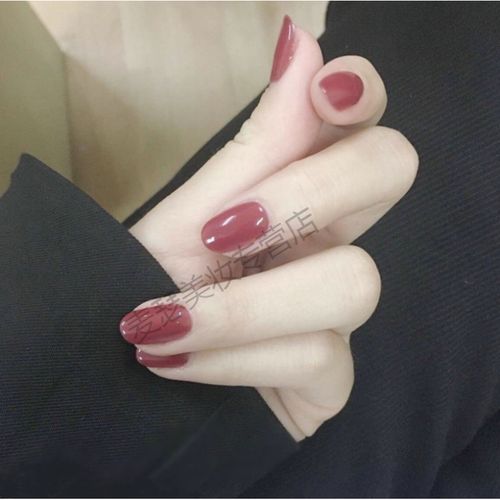 橙美甲图片