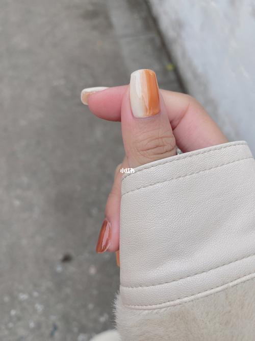 橙美甲图片