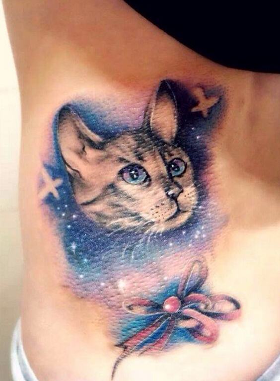 腰部彩色星空猫咪蝴蝶结纹身图案图片