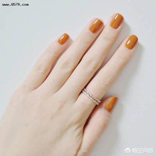 橙美甲图片