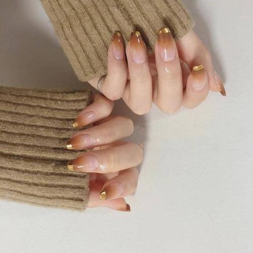 橙美甲图片