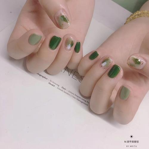 橙美甲图片