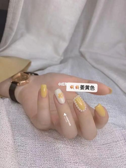 橙美甲图片