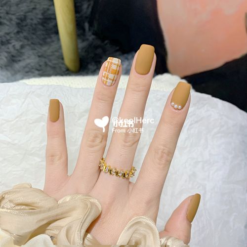 橙美甲图片