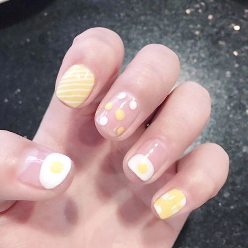 橙美甲图片
