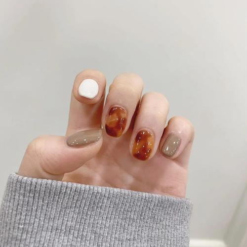 琥珀色美甲图片 琥珀色美甲图片红色图片