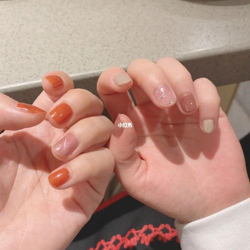 橙美甲图片