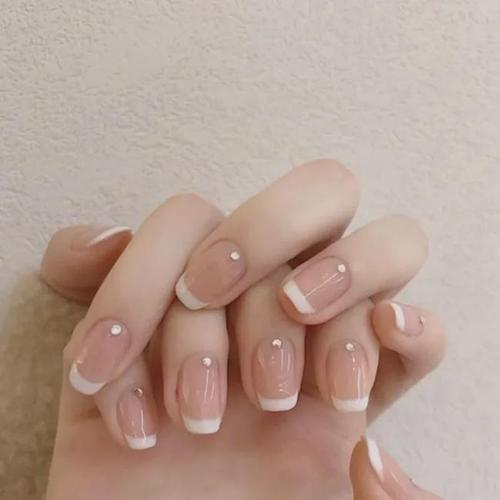橙美甲图片