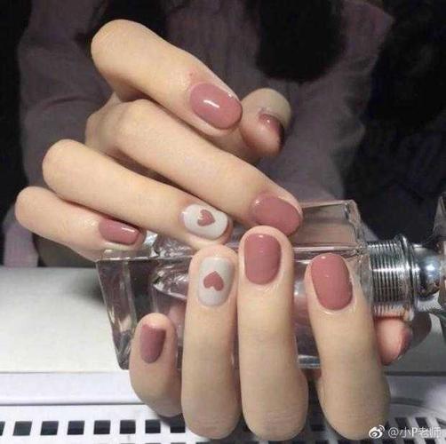 橙美甲图片