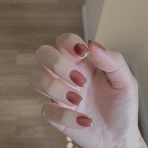 橙美甲图片