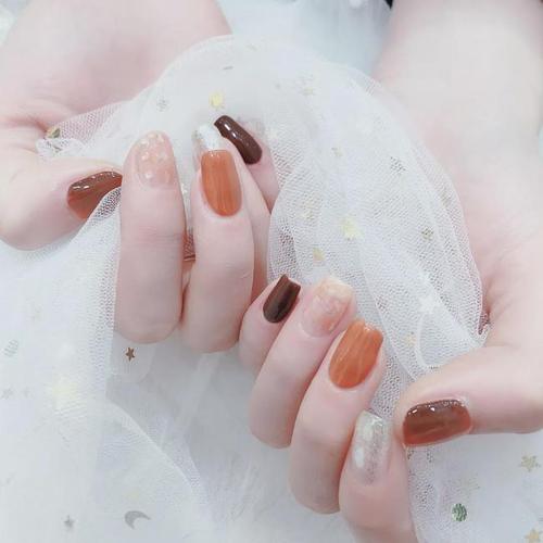 橙美甲图片