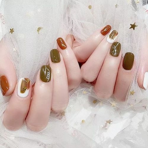 橙美甲图片