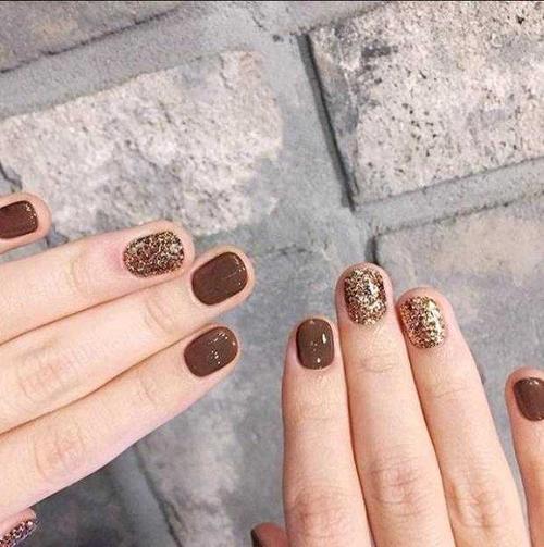 橙美甲图片