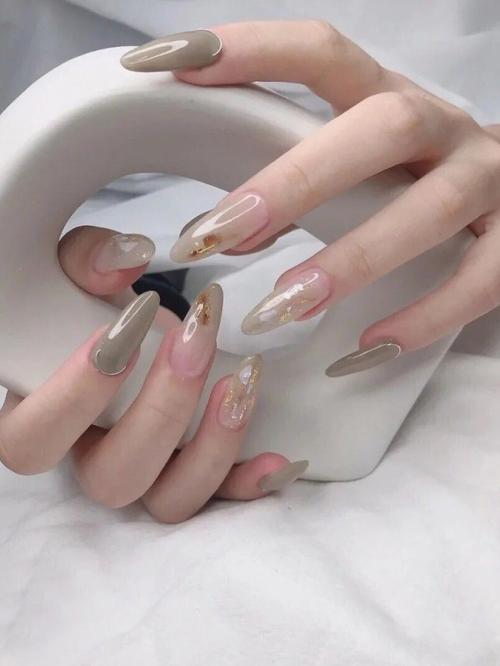 橙美甲图片
