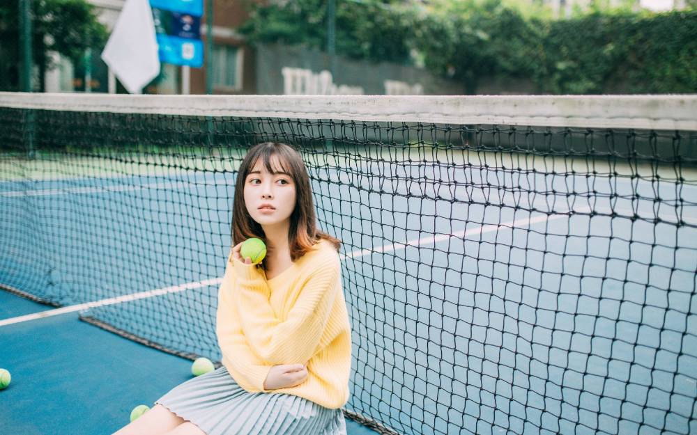清纯网球美女俏皮写真手机壁纸下载_高清手机壁纸图片大全图片