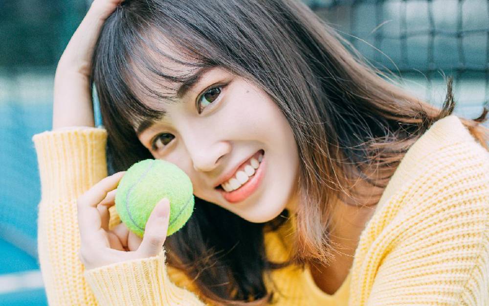 清纯网球美女俏皮写真手机壁纸下载_高清手机壁纸图片大全图片