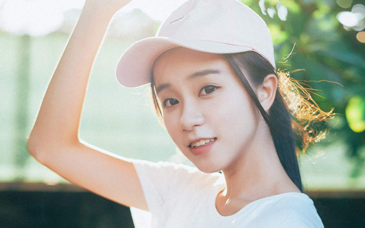 清纯网球美女俏皮写真手机壁纸下载_高清手机壁纸图片大全图片