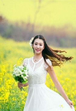 油菜花田唯美白色婚纱美女户外写真手机壁纸