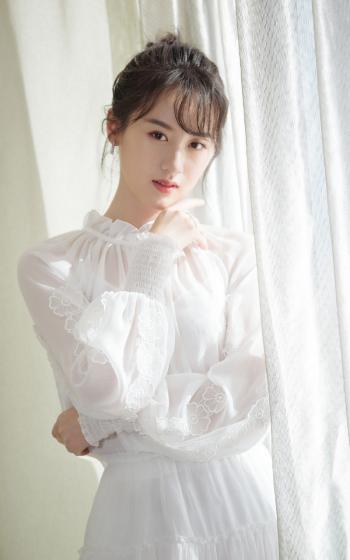 主持人李湘写真图片:清新淡雅宛若仙子第3张