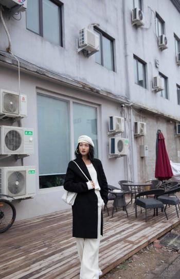 中国内地节目主持人、影视演员朱丹白色系写真优雅大气写真图片第0张