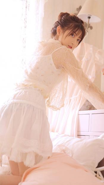 蕾丝丸子头美女手机壁纸第0张
