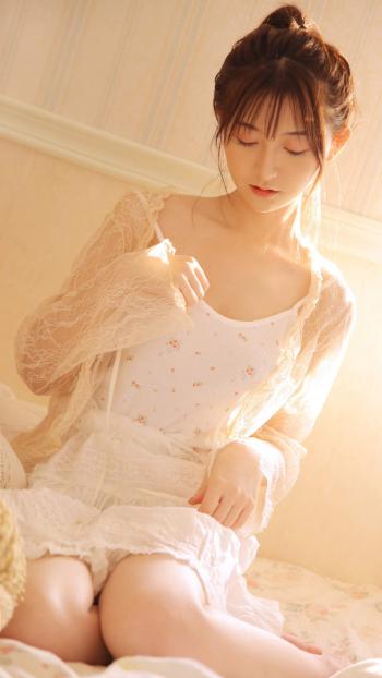 蕾丝丸子头美女手机壁纸第1张