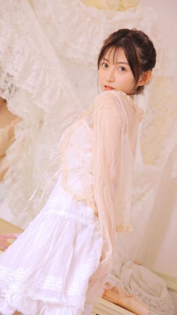 蕾丝丸子头美女手机壁纸第6张