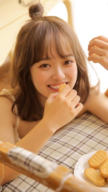 可爱丸子头美女手机壁纸第6张