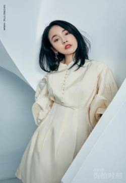 高清吉林省辽源女明星张佳宁米色连衣裙性感写真图片
