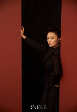 中国内地影视女演员林源黑色西装魅力写真图片