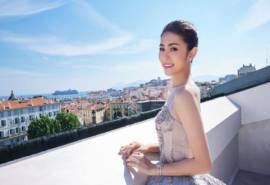 中国台湾影视女演员任容萱白裙优雅性感写真图片